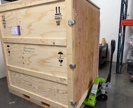 Reusable wood crate for crating and shipping to a tradeshow