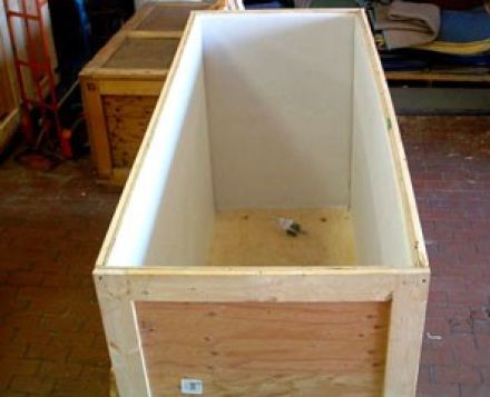 This is a custom wood shipping crate with a foam interior for shipping fragiel and valuable art and electronic items.