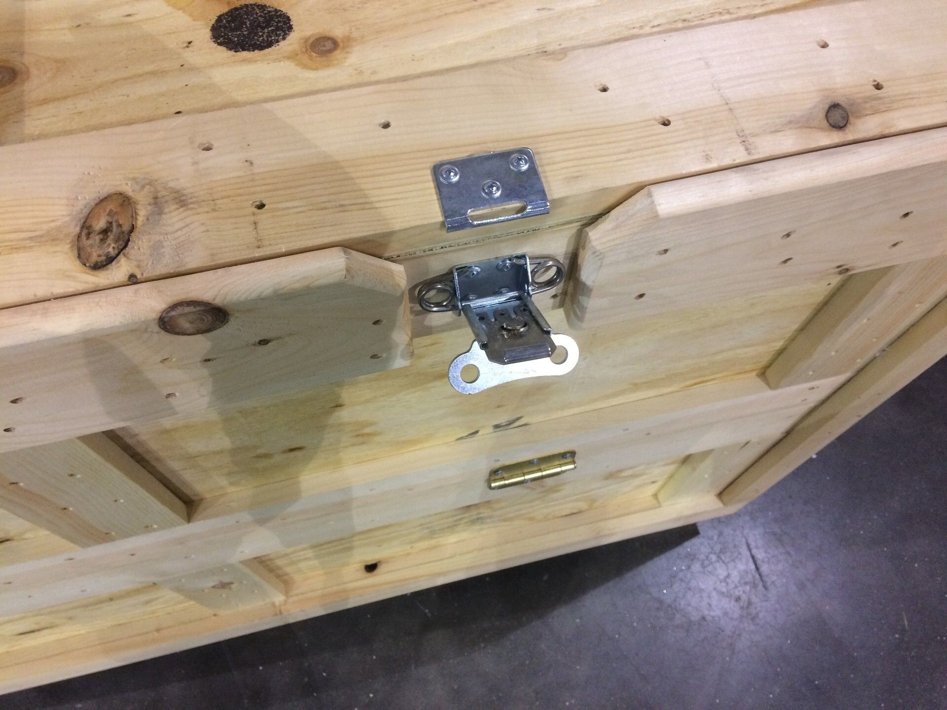 In this photo is a "tradeshow crate" with link locks.  The custom wood shipping crate is to ship antiques, electronics.