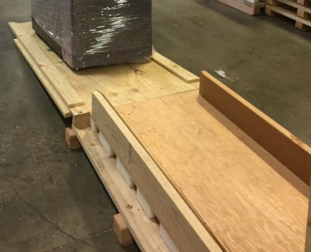 A custom wood crate with a ramp for shipping a server for a silicon valley company