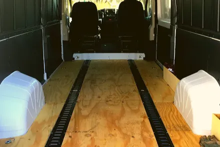 Art shuttle sprinter van wood floor for dedicated transport with art dedicated vanline for art shipper implied.