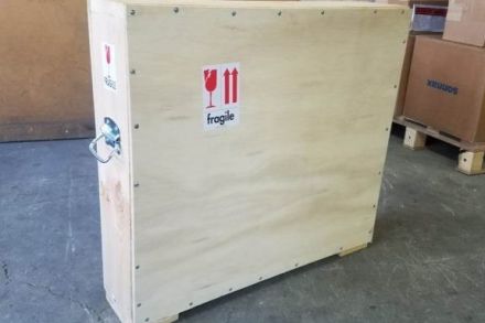 art canvas wood shipping crate for arts and antiques transportation.  wood shipping crate. art logistics implied.
